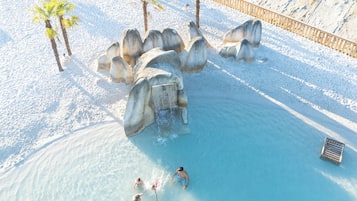 Indoor pool, open 10:00 AM to 8:00 PM, pool umbrellas