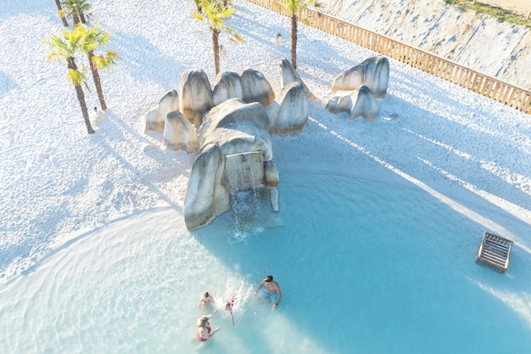 Indoor pool, open 10:00 AM to 8:00 PM, pool umbrellas