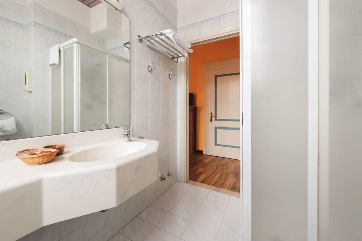 superior double room | bathroom | hair dryer, bidet, towels