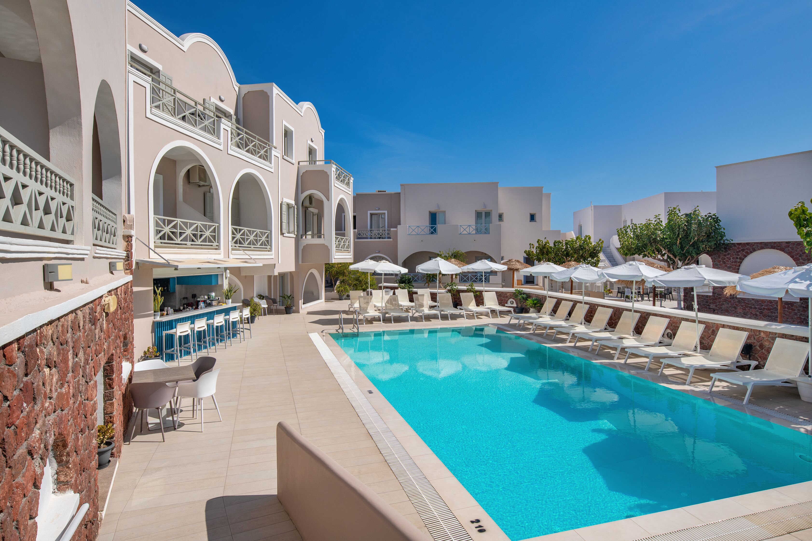 seasonal outdoor pool, pool umbrellas, pool loungers