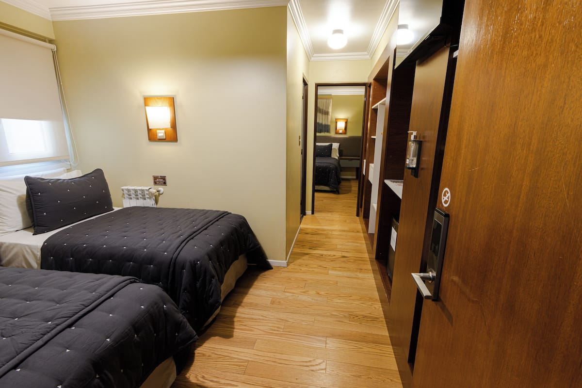 Standard Quadruple Room, 1 Bedroom | 6 bedrooms, premium bedding, minibar, in-room safe