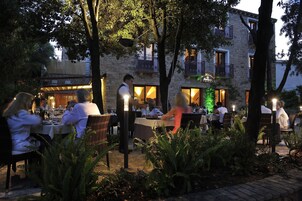 Dinner served, garden views 