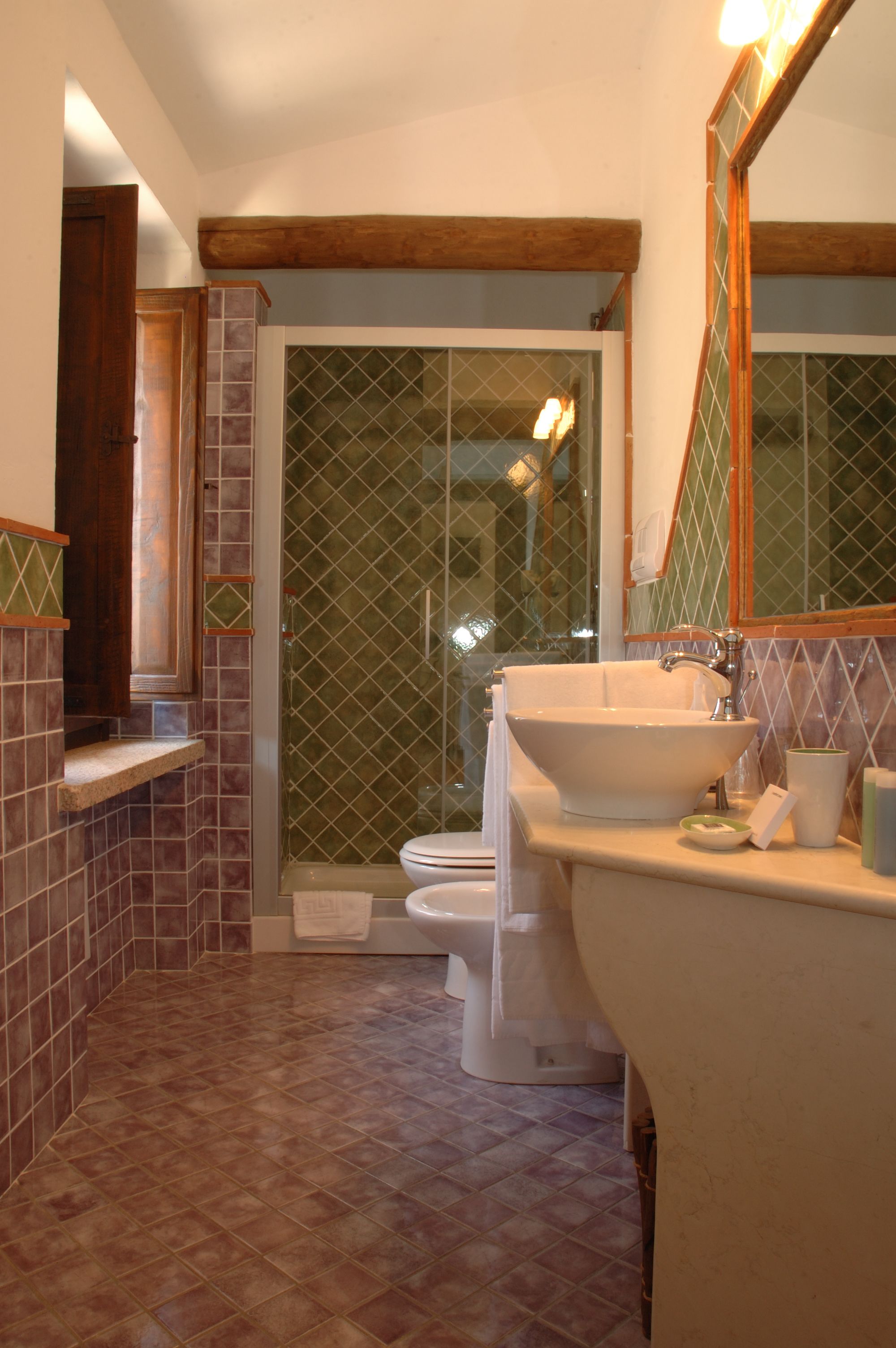 designer toiletries, hair dryer, bathrobes, bidet