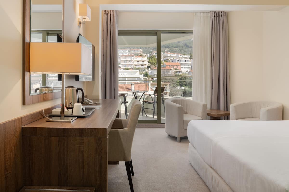 standard double room, mountain view | 1 bedroom, down duvets, minibar, in-room safe