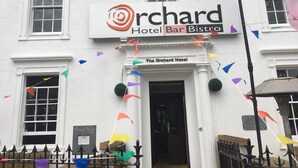 The Orchard Hotel with a signboard indicating it has a hotel, bar, and bistro. - Orchard Hotel (Falkirk)