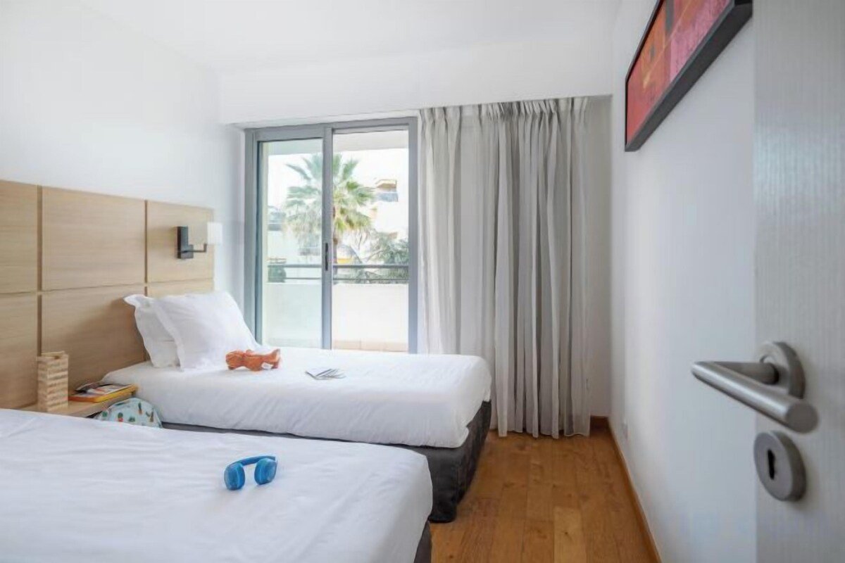 Blackout drapes, soundproofing, iron/ironing board (on request)