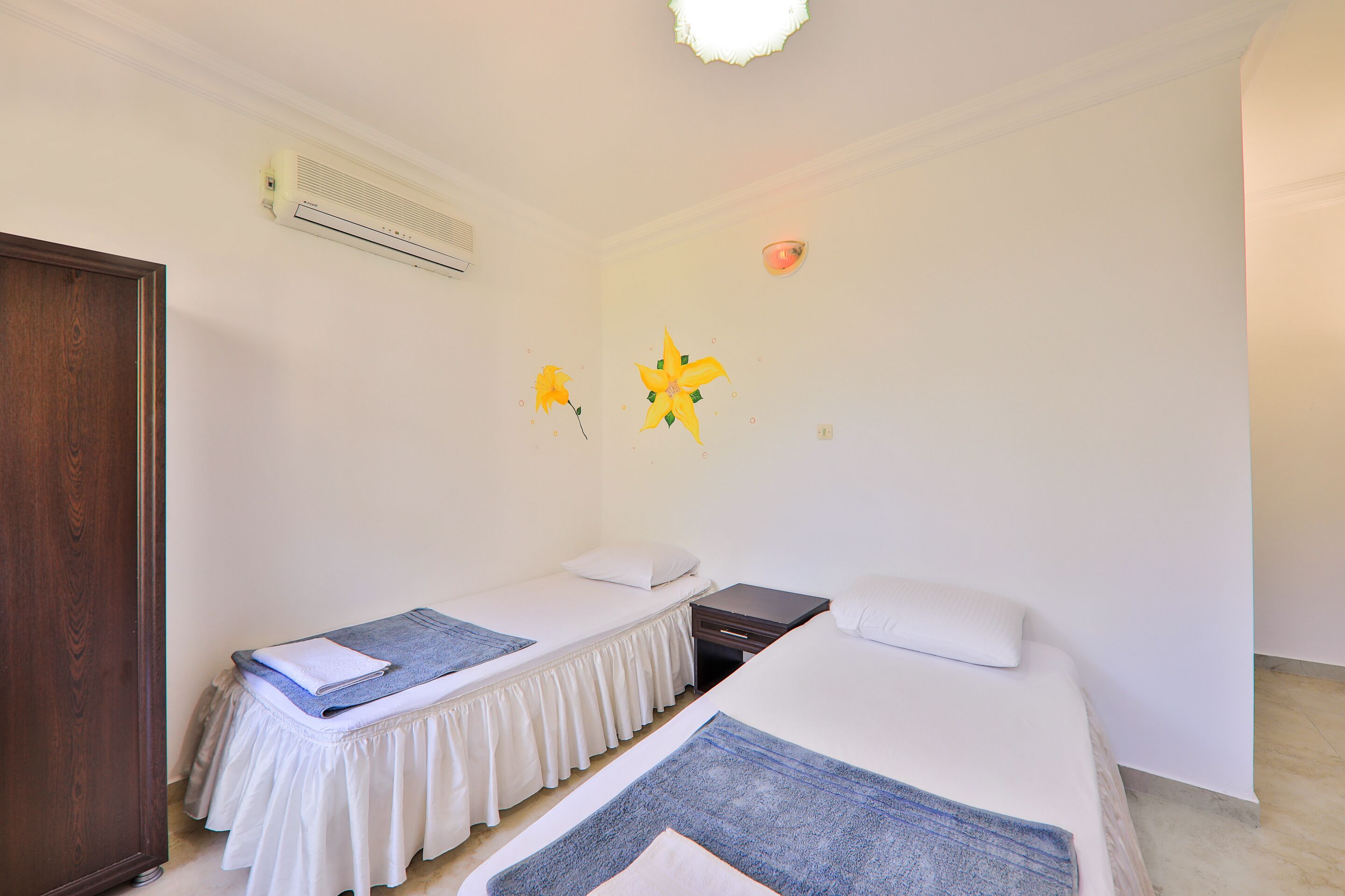 economy twin room, garden area | egyptian cotton sheets, premium bedding, down duvets, in-room safe