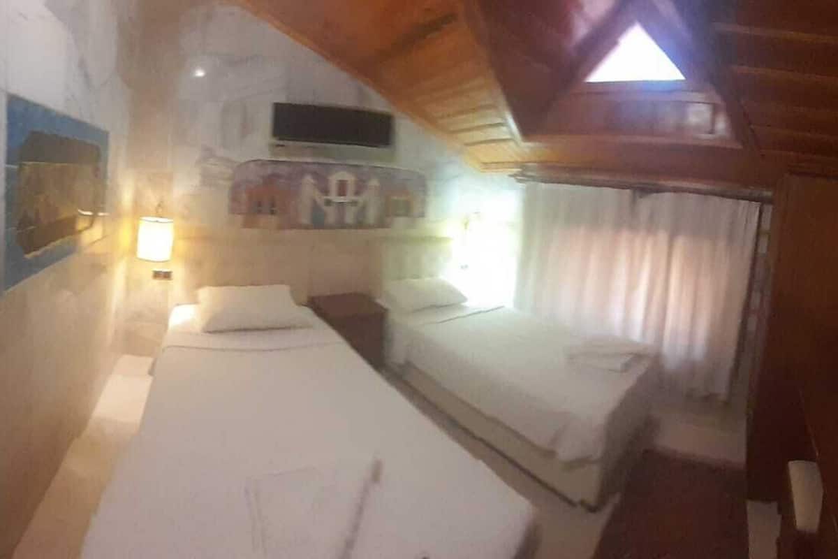 Chambre Économique Double ou avec lits jumeaux