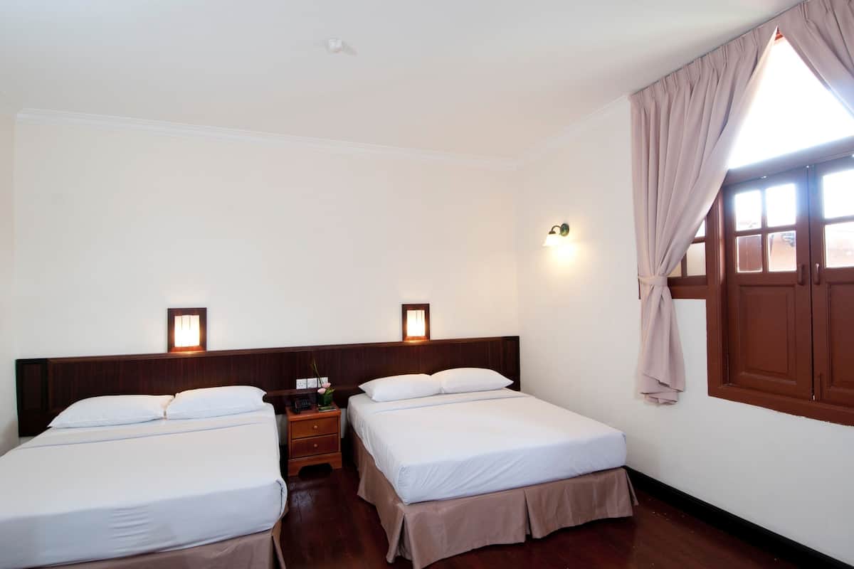Desk, blackout curtains, iron/ironing board, rollaway beds