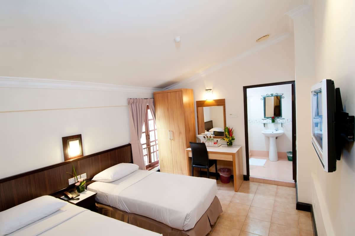 Desk, blackout curtains, iron/ironing board, rollaway beds