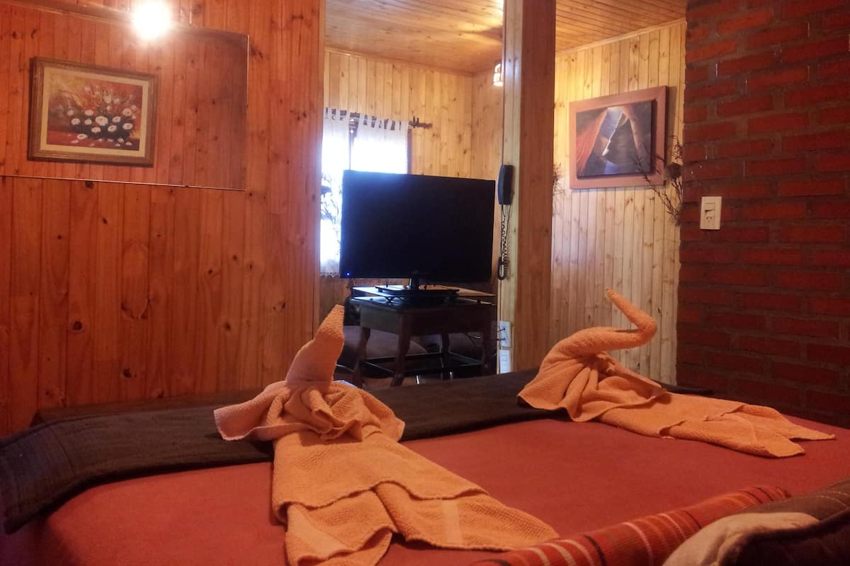 Caja de seguridad en la habitación, camas extra y ropa de cama