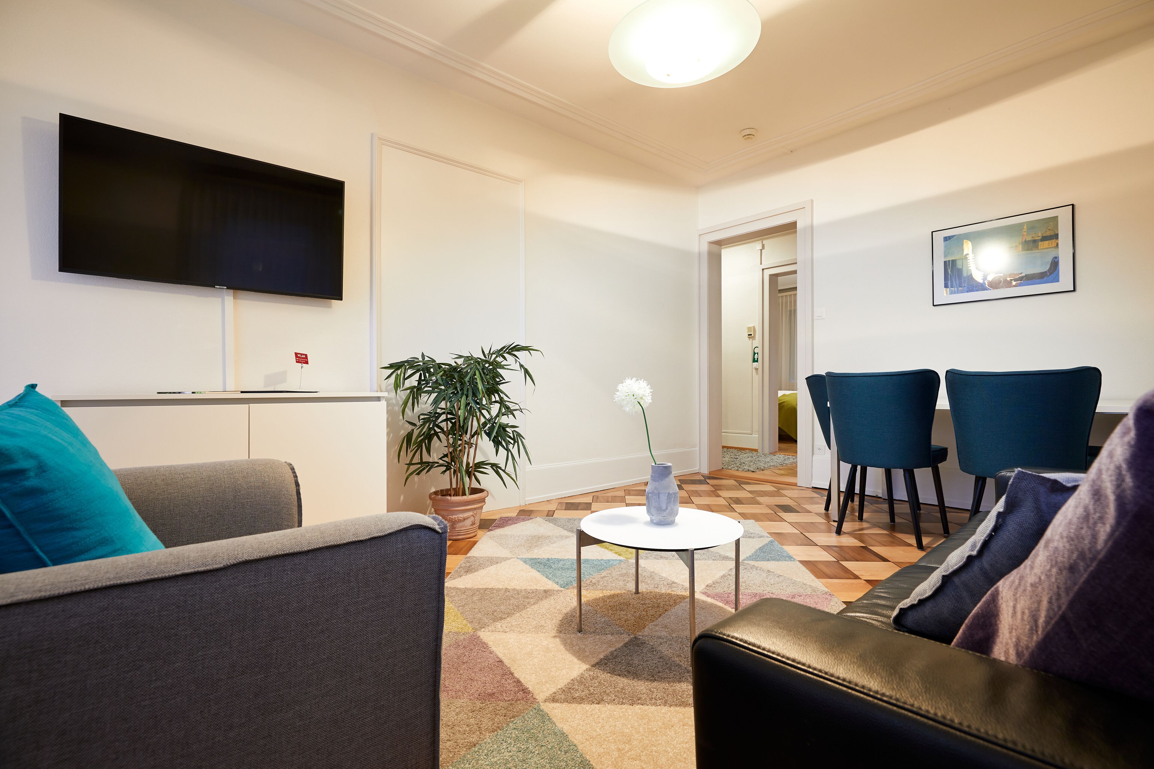 family apartment, lake view | living area | 43-inch lcd tv with cable channels, tv