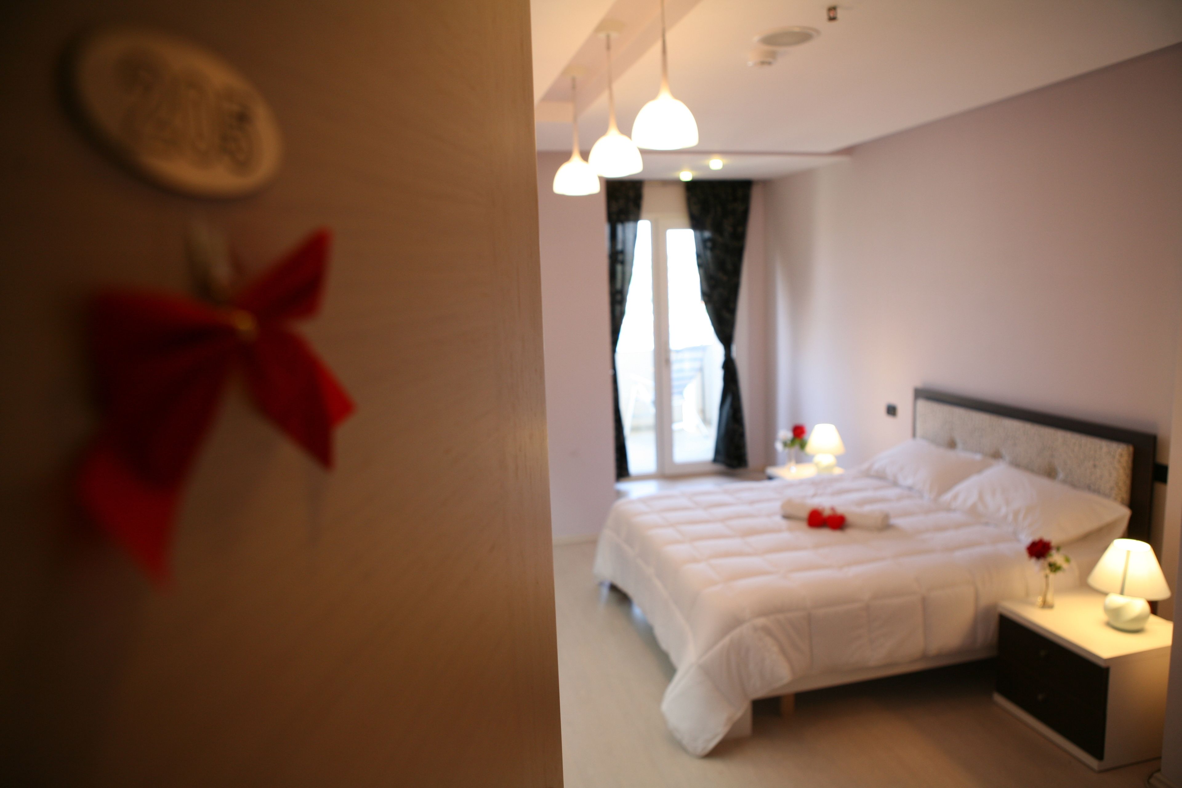 Literie de qualité supérieure, minibar, décoration personnalisée