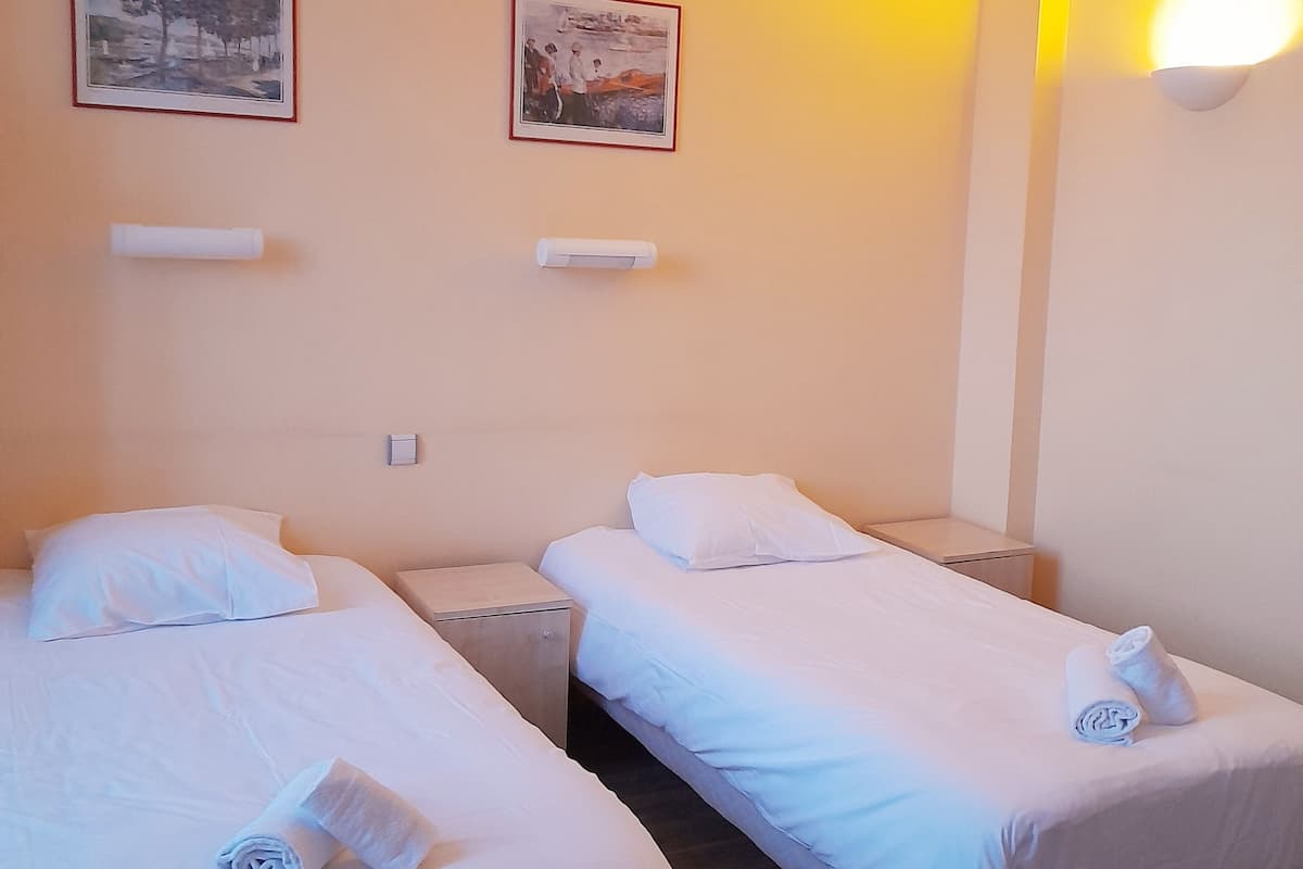Twin Room (no TV) | Desk, laptop workspace, free WiFi, bed sheets