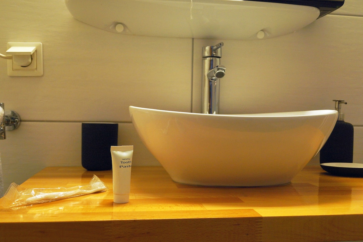 panoramic apartment, 1 bedroom, kitchenette, city view | bathroom | shower, free toiletries, hair dryer, towels