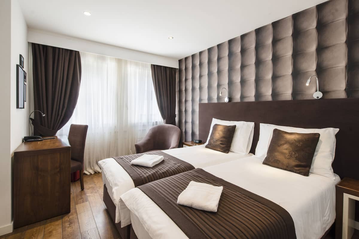 standard double or twin room | premium bedding, in-room safe, desk, soundproofing