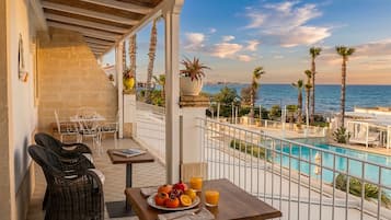 Suíte executiva, vista para o mar | Terraço/pátio