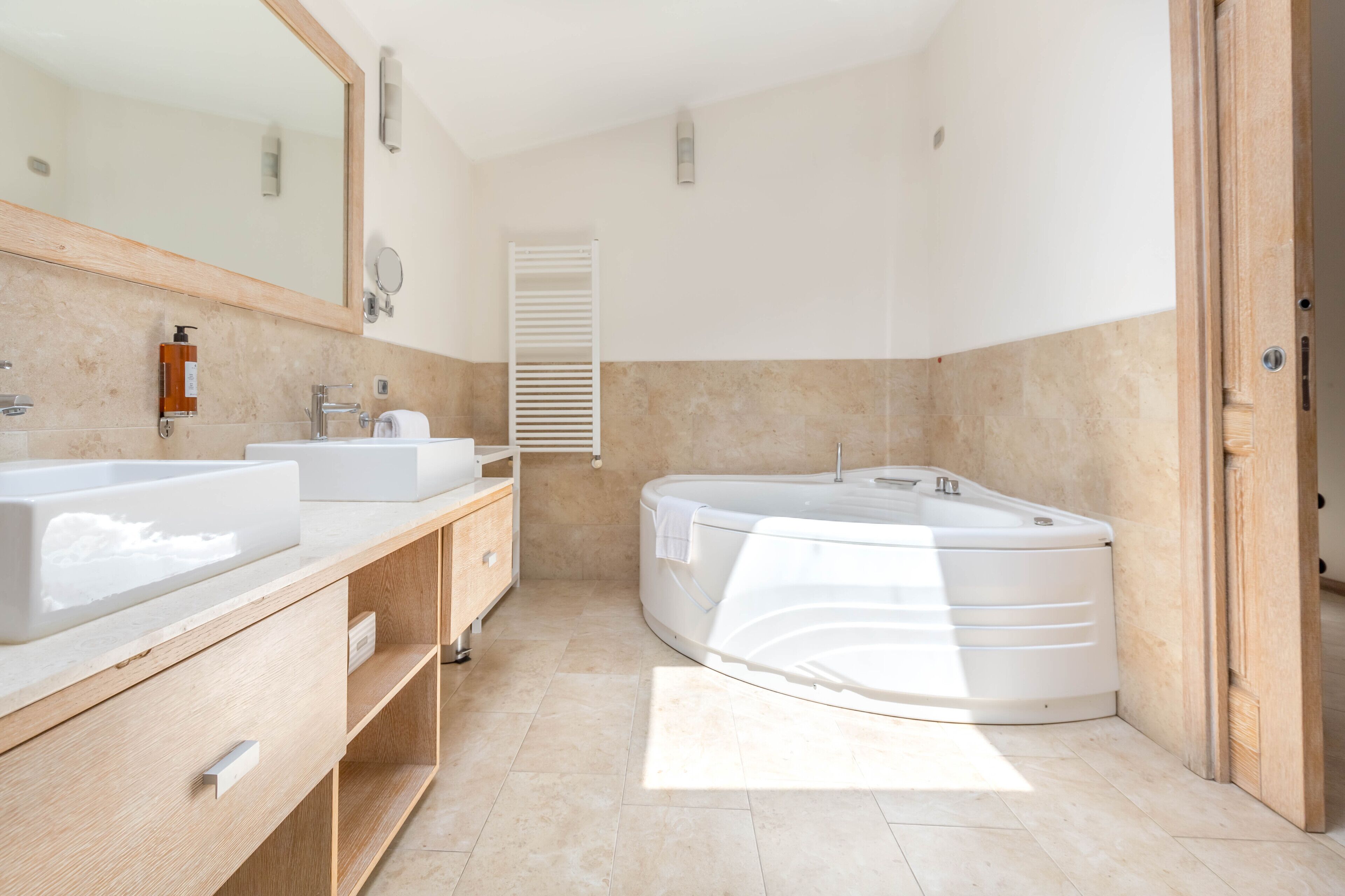 junior suite | bathroom | shower, rainfall showerhead, free toiletries, hair dryer