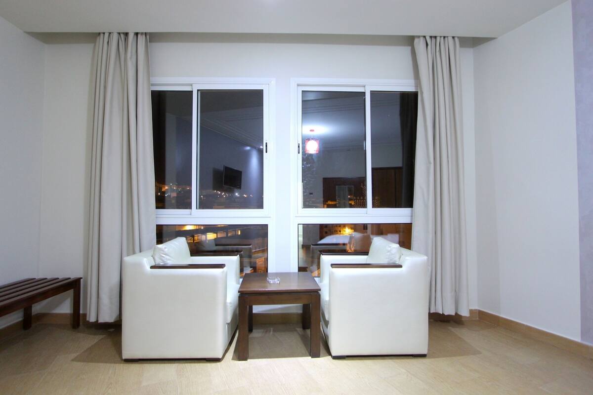 Double Room | Living area | Flat-screen TV