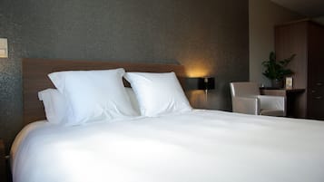 Premium bedding, individually furnished, desk, blackout drapes