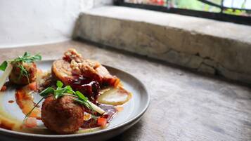 Breakfast, lunch, dinner served; garden views