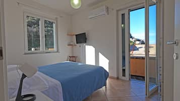 1 Bedroom Apartment, separate building | 1 bedroom, down comforters, desk, laptop workspace