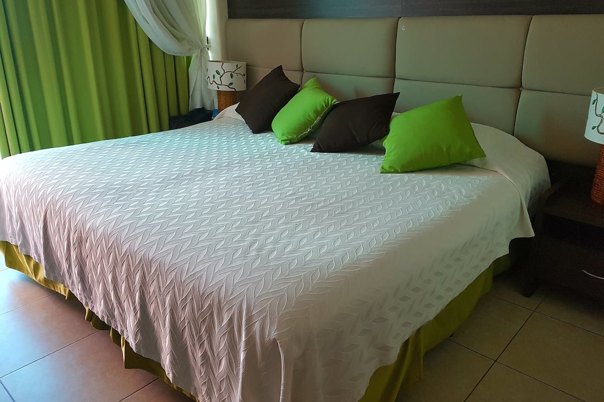 Room, Partial Ocean View | Premium bedding, free minibar, in-room safe, individually decorated