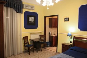 Apartment, 1 Bedroom | Minibar, in-room safe, desk, soundproofing - Del Corso (Naples)