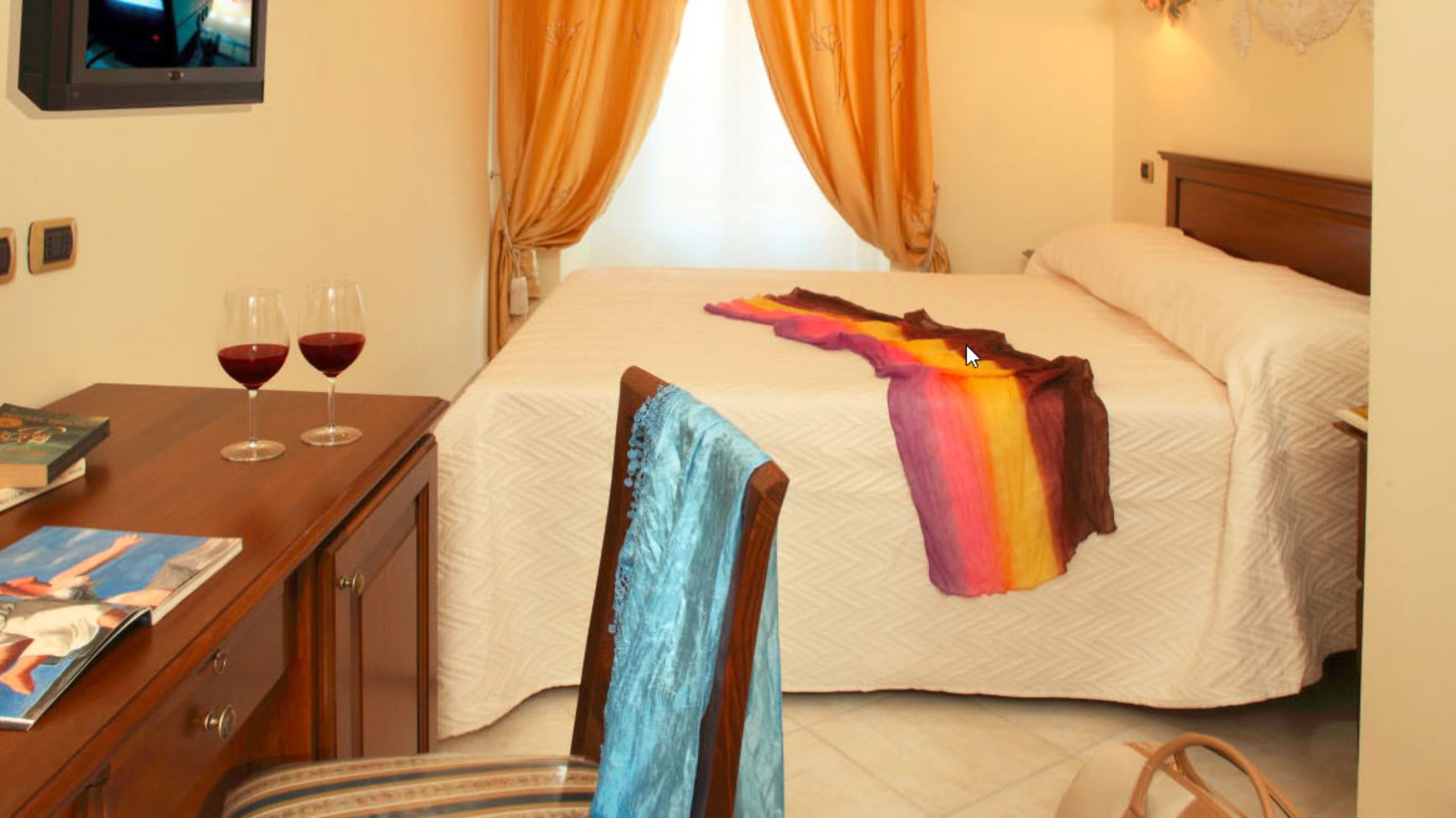 economy room (no elevator) | in-room safe, desk, soundproofing, free cots/infant beds