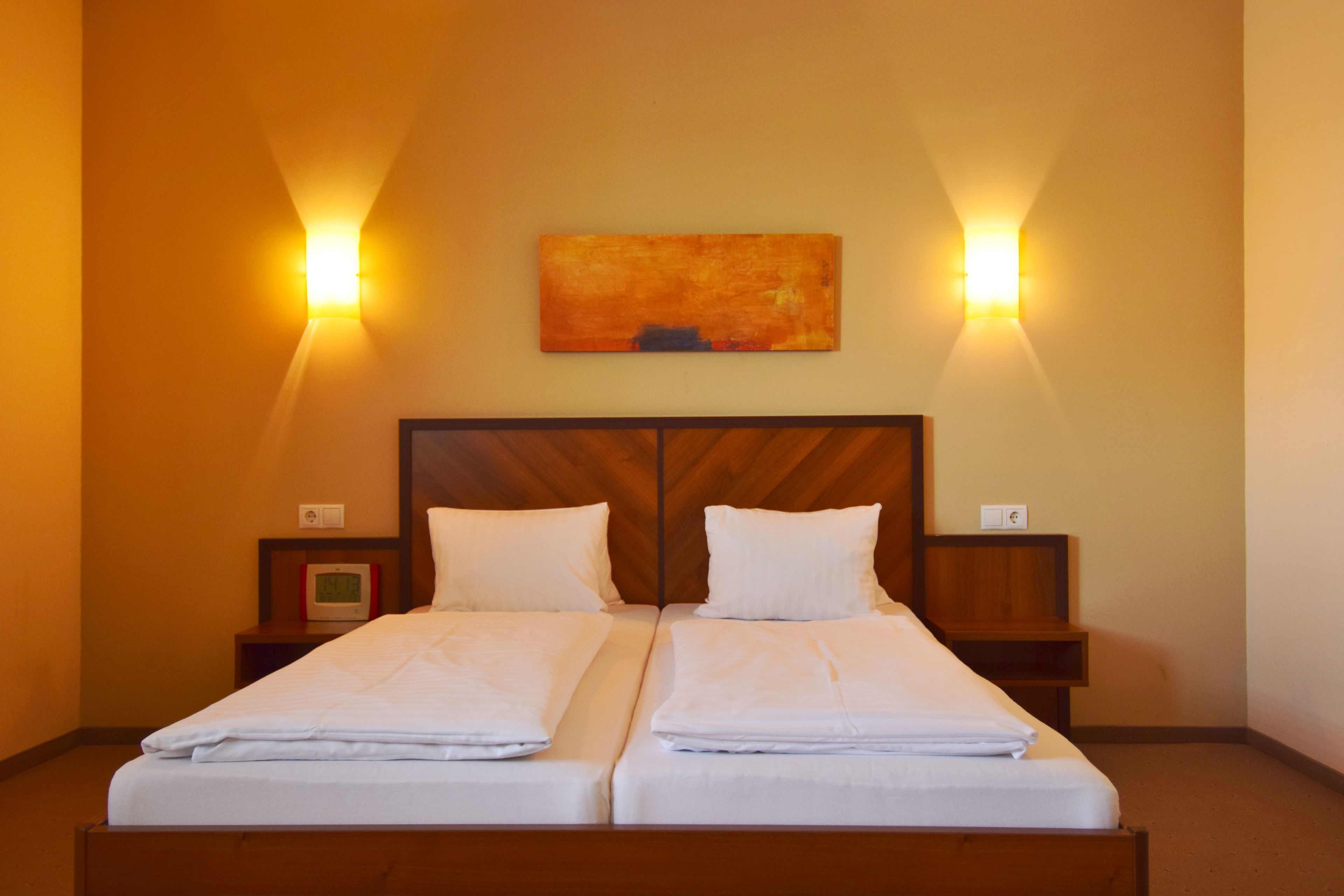 Junior suite | Een kluis op de kamer, een bureau, verduisterende gordijnen, gratis wifi