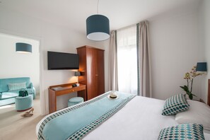 Suite | Premium-sengetøj, dundyner, minibar, pengeskab på værelset
