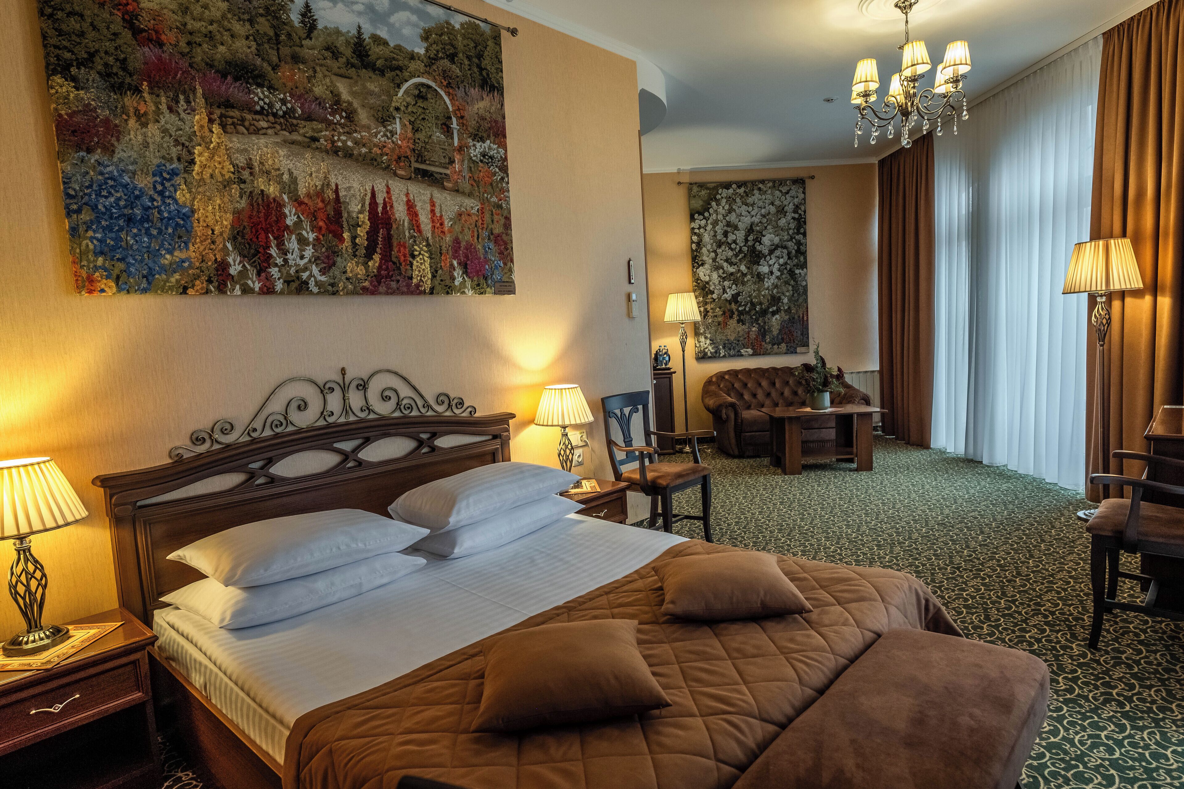 Deluxe tweepersoonskamer | Luxe beddengoed, een minibar, een kluis op de kamer