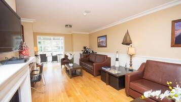 28-inch TV with cable channels, DVD player, iPod dock