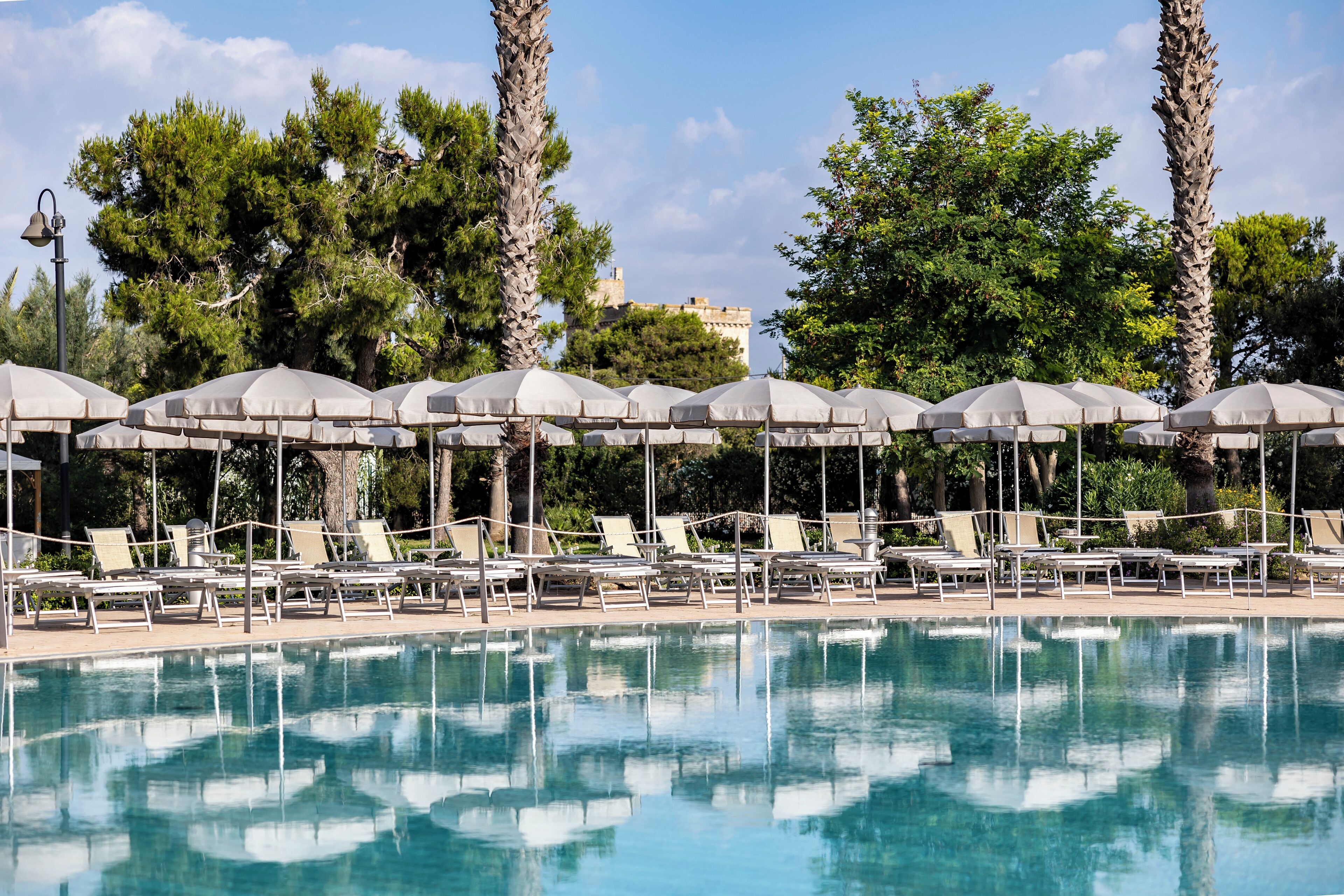 outdoor pool, pool umbrellas, pool loungers