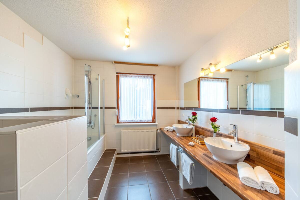 family room for 2 adults and 2 children teens | bathroom | free toiletries, hair dryer, towels