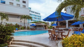Outdoor pool, pool umbrellas, sun loungers