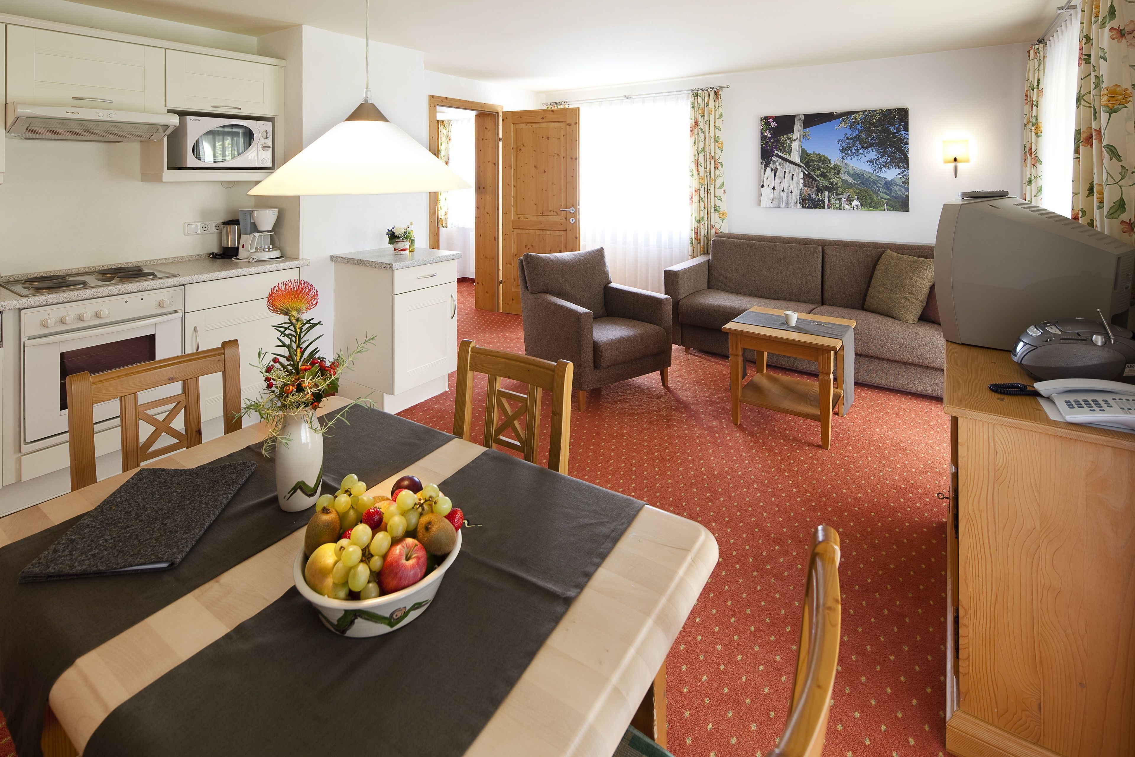 Full-sized fridge, microwave, stovetop, dishwasher