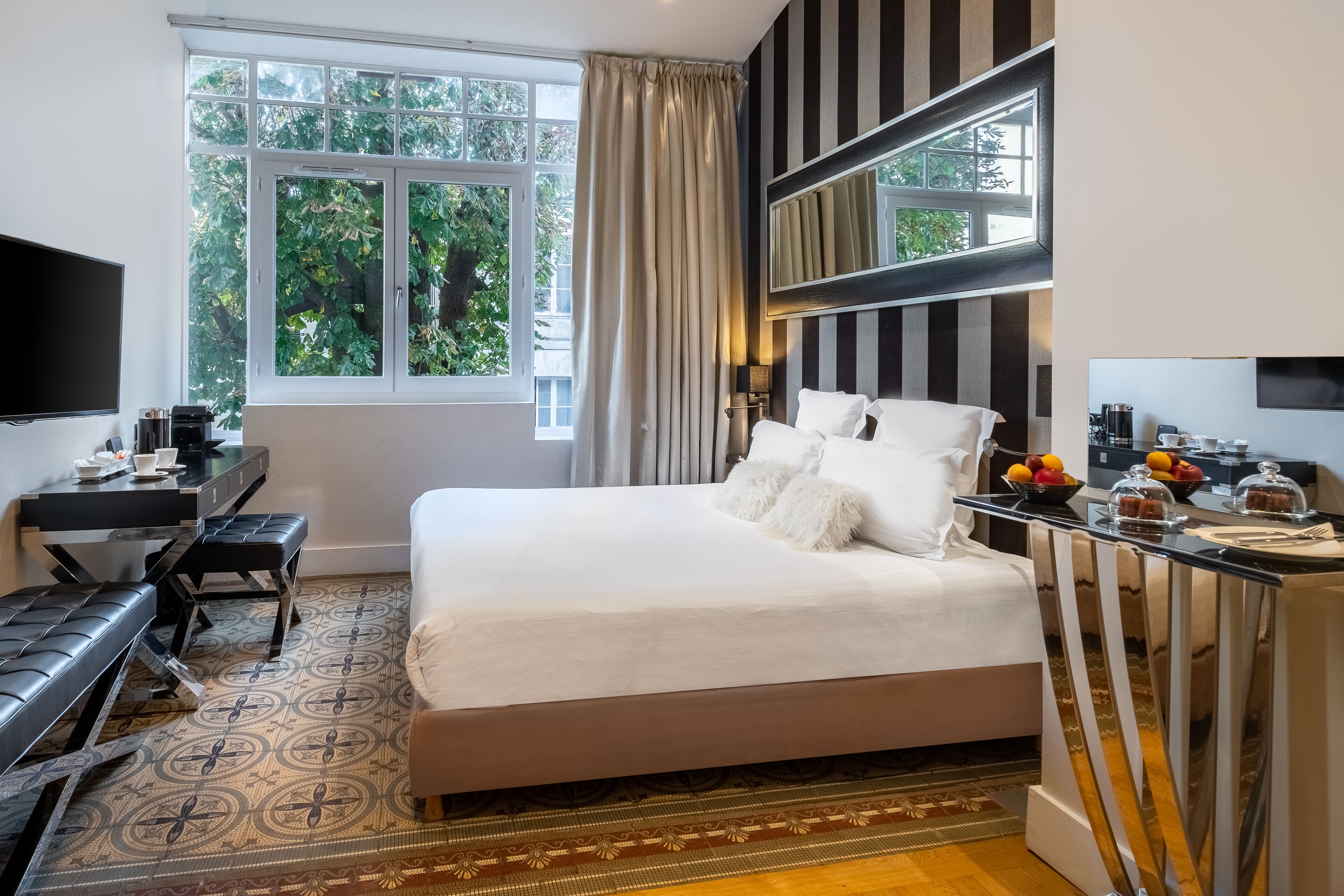 deluxe double room | 2 bedrooms, free minibar, in-room safe, individually decorated