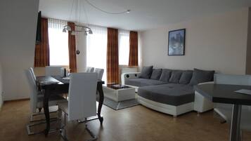 Holiday Apartment (incl. end cleaning fee €70) | Living room | Flat-screen TV