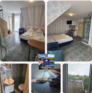 A hotel room with a bed, a desk, a shower, and a view of the countryside. - Hotel Arche Noah (Wangerland)