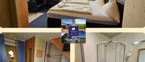 A hotel room with a bed, a desk, a TV, and a shower area.