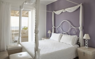 Roupas de cama premium, frigobar, cofres nos quartos