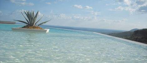 Outdoor pool, pool umbrellas, pool loungers