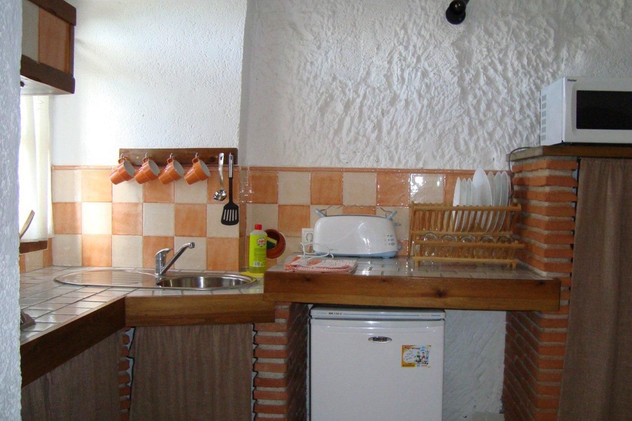 standard apartment, 1 bedroom | private kitchen | full-sized fridge, microwave, stovetop, high chair