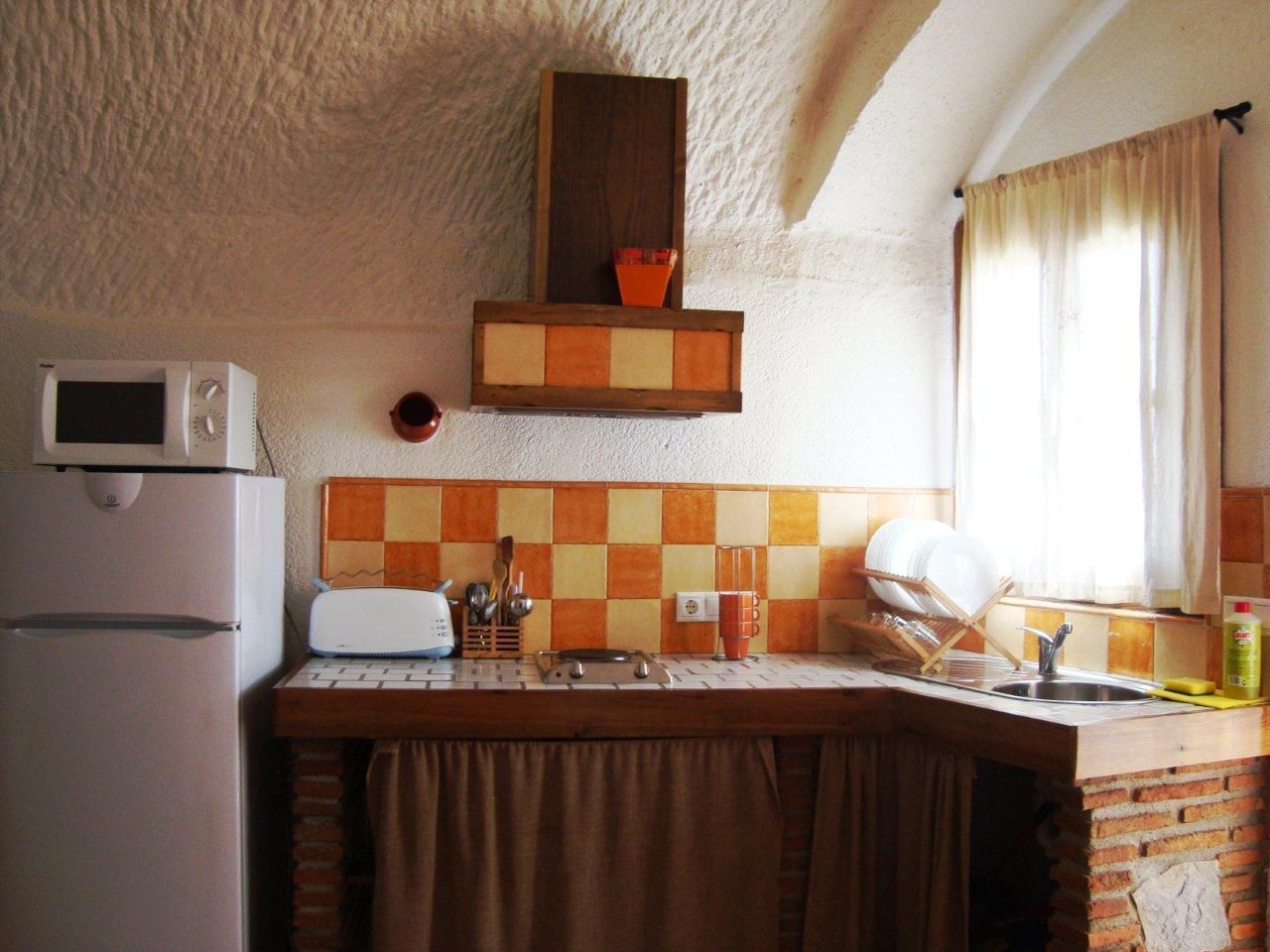 standard apartment, 1 bedroom | private kitchen | full-sized fridge, microwave, stovetop, high chair