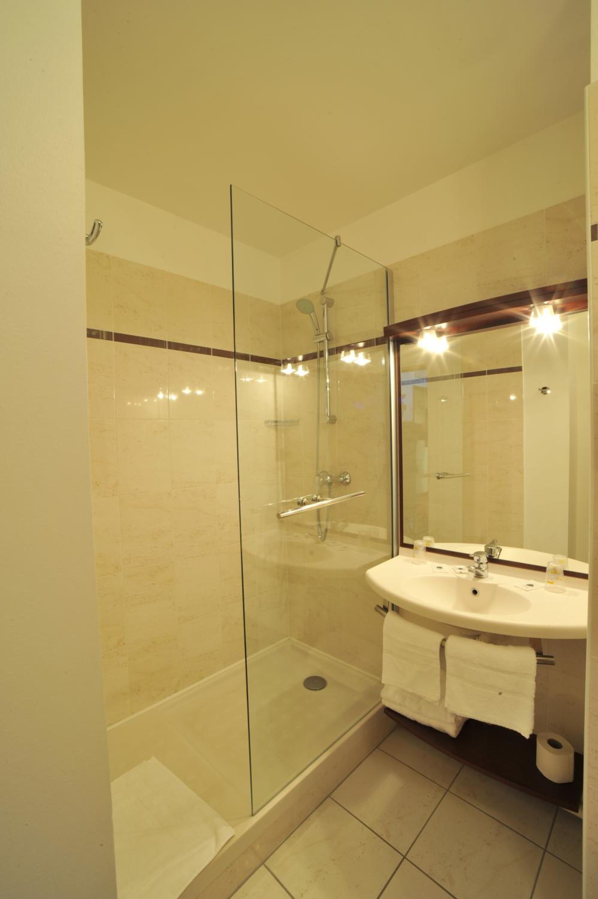 shower, free toiletries, hair dryer, towels