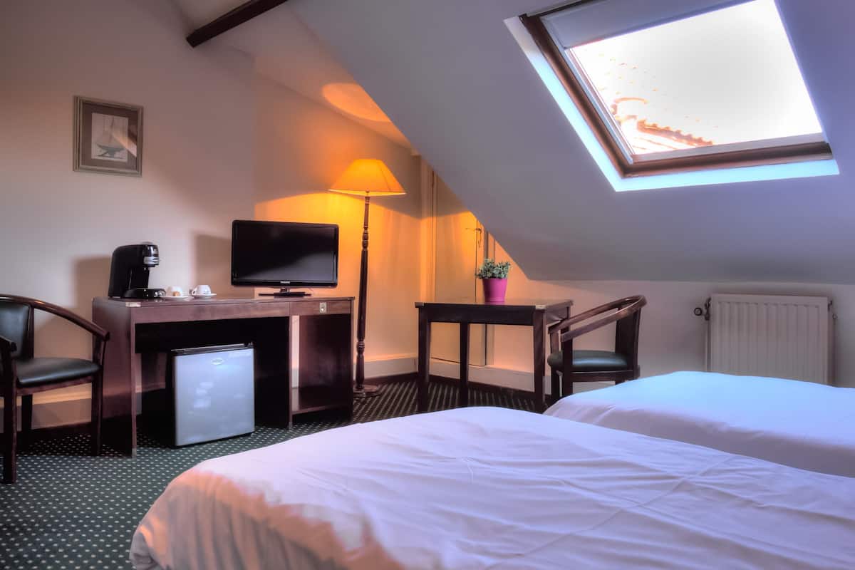 Pillow-top beds, desk, laptop workspace, blackout curtains
