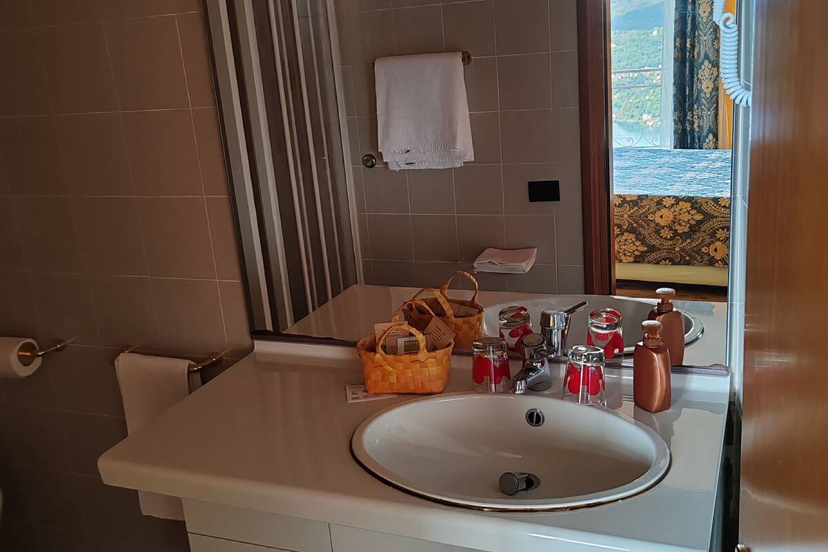 superior double or twin room, lake view | bathroom | shower, rainfall showerhead, free toiletries, hair dryer