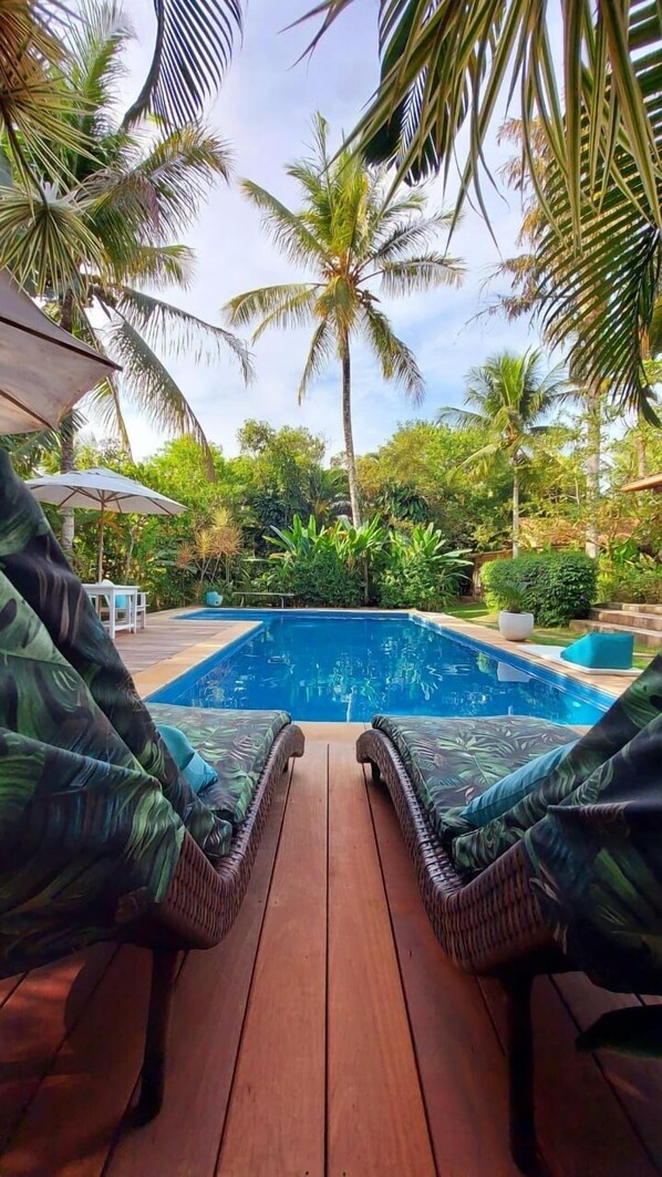 Outdoor pool, pool umbrellas, pool loungers