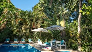 Outdoor pool, pool umbrellas, sun loungers